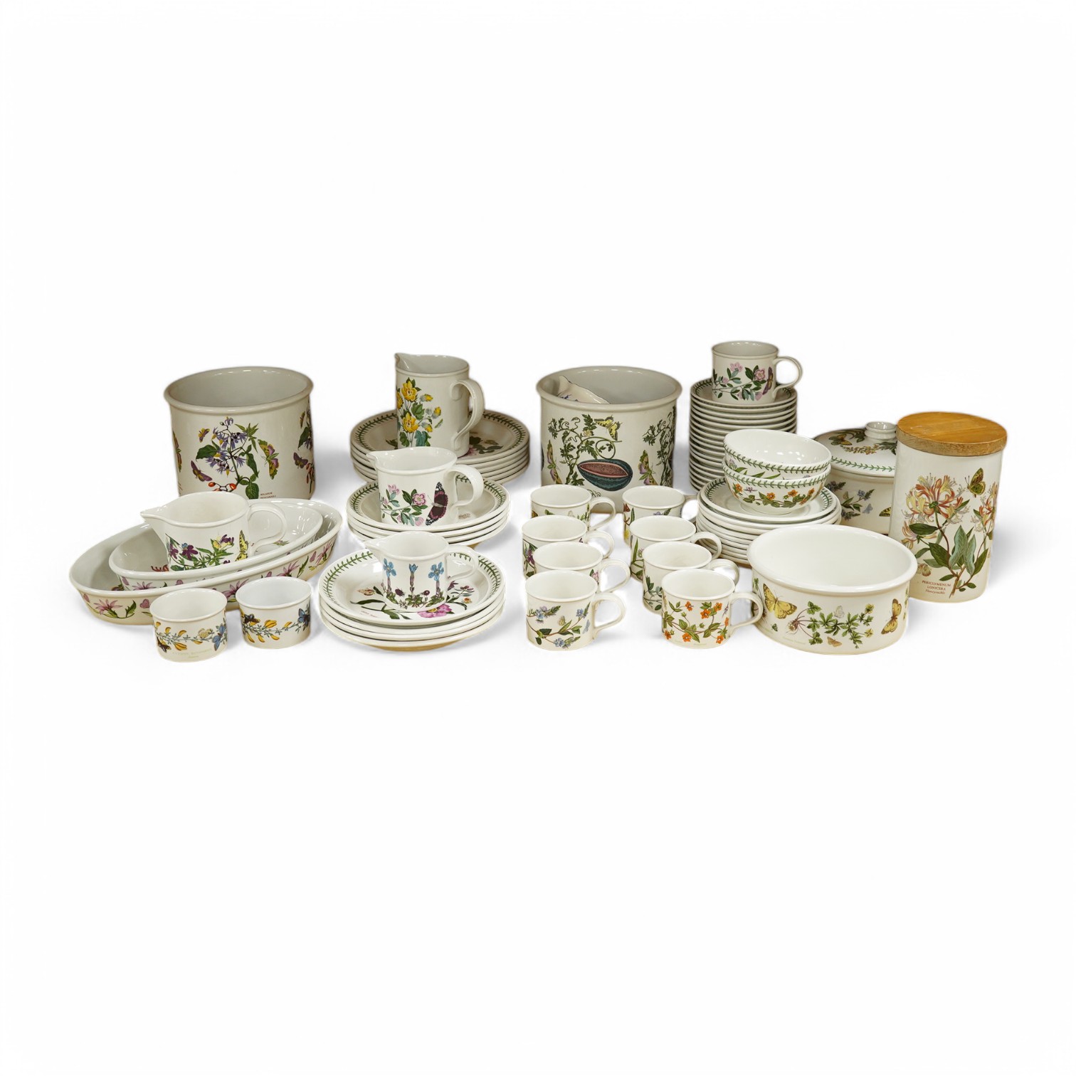 A quantity of Portmeirion tableware to include oval dishes, cups, saucers and dinner plates. Condition - mostly fair, some cracks